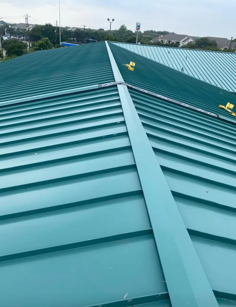 Green commercial metal roof ridge and valley for Metal Roof Repair in Logansport